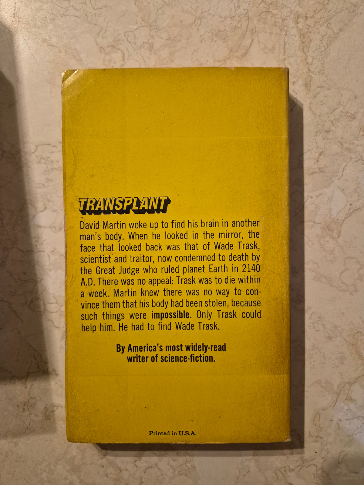 Yellow back cover of The Mind Cage by A.E. van Vogt with Transplant synopsis