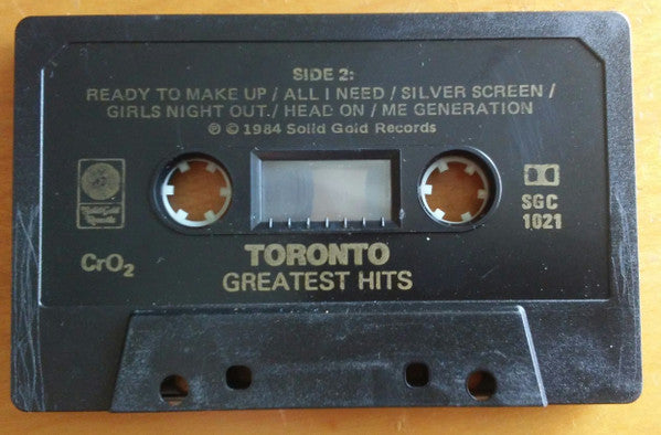 Toronto (4) : Greatest Hits (Cass, Comp, CrO)