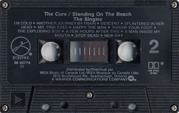 The Cure : Standing On A Beach • The Singles (And Unavailable B-Sides) (Cass, Comp, M/Print, RP, Dol)