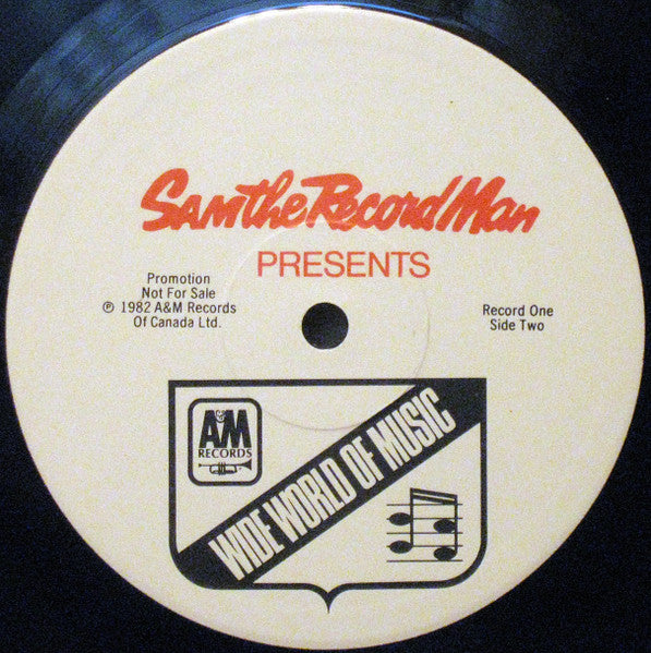 Various : Sam The Record Man Presents/Presente Wide World Of Music (2xLP, Comp, Promo, Smplr)