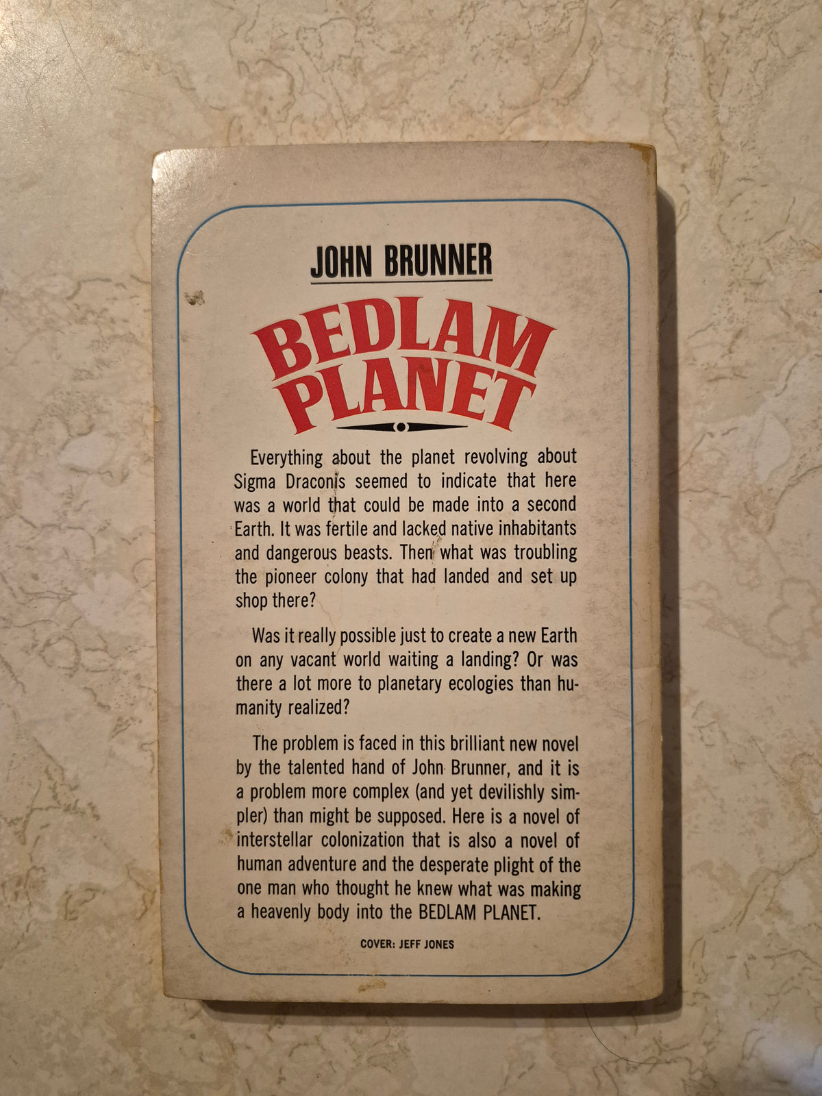 Back cover of Bedlam Planet by John Brunner with synopsis and Jeff Jones cover credit