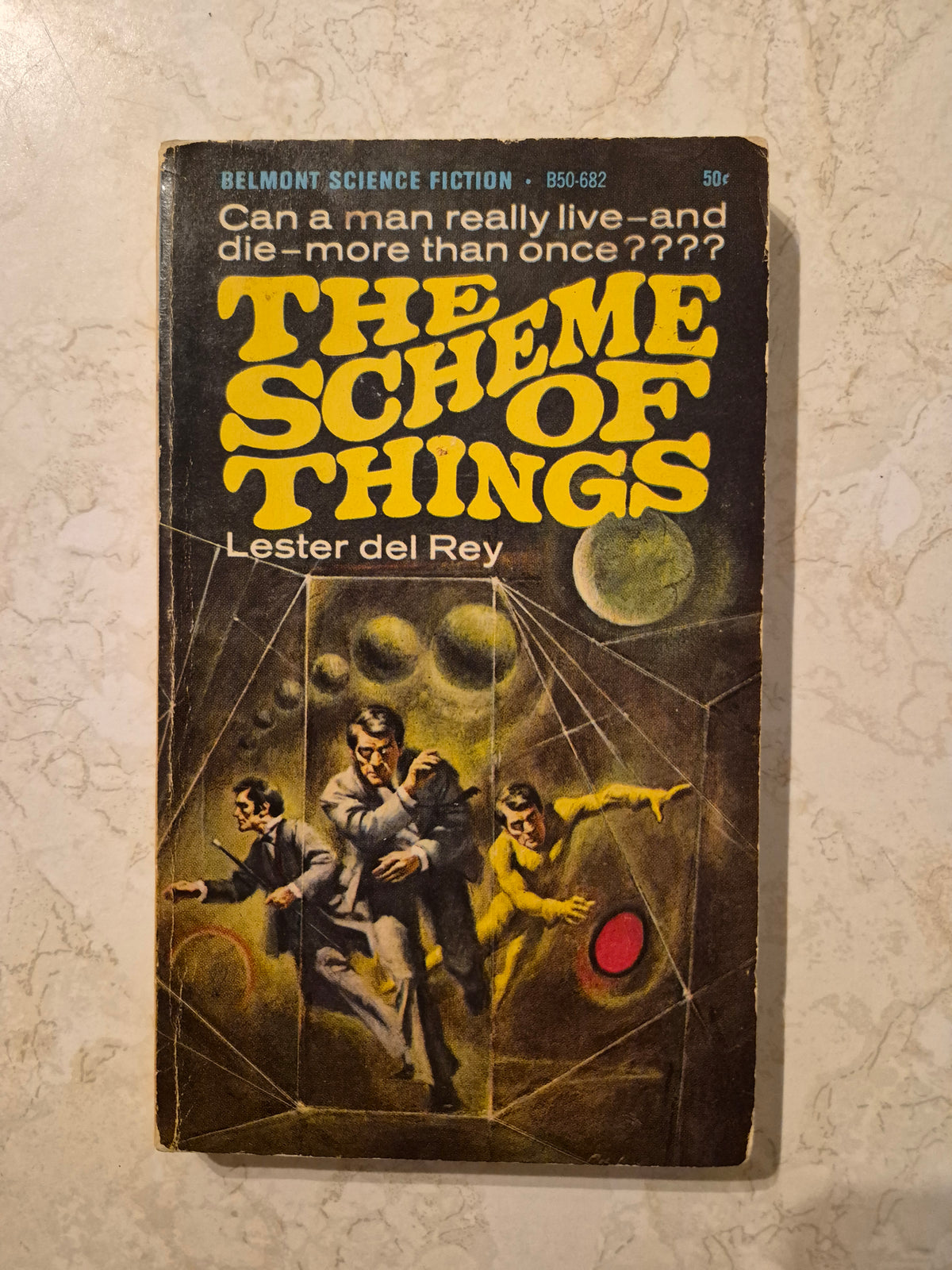 Front cover of The Scheme of Things by Lester del Rey with visible wear