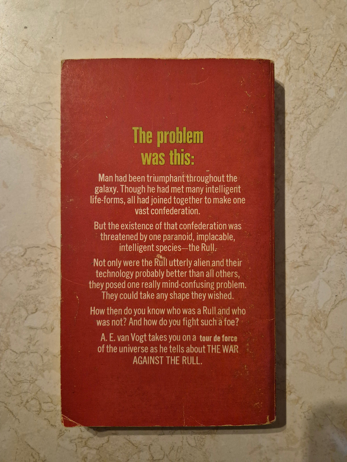 Back cover of The War Against the Rull by A.E. van Vogt showing synopsis and wear