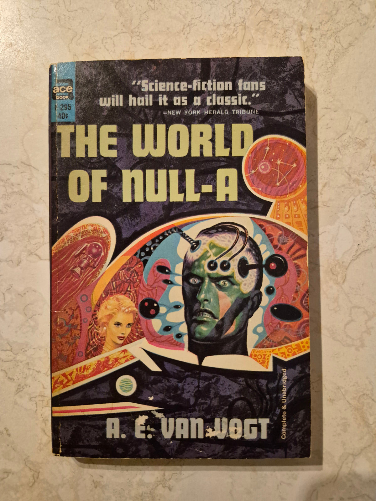 Front cover of The World of Null-A by A.E. van Vogt showing scuffs and wear