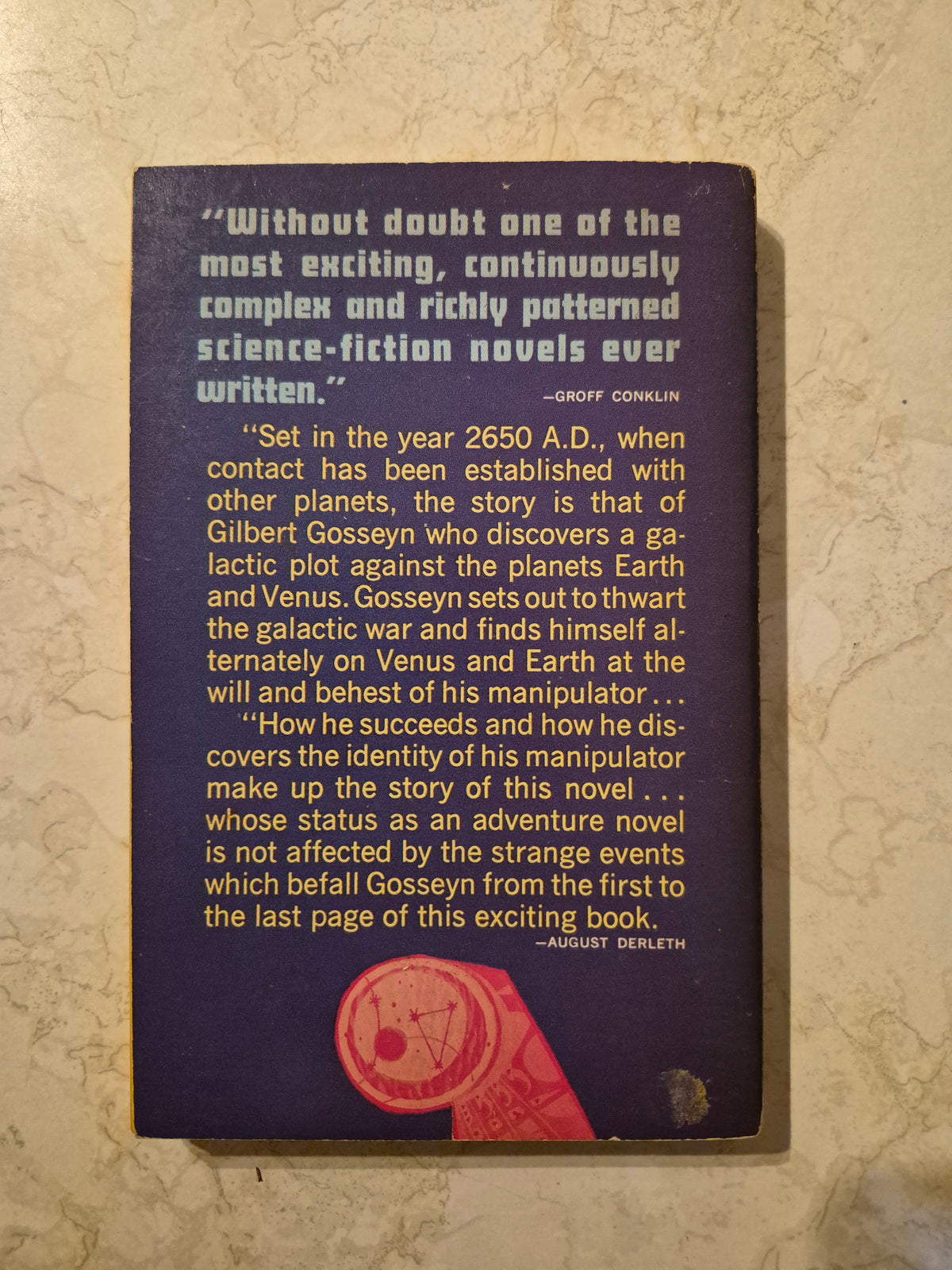Back cover of The World of Null-A by A.E. van Vogt showing synopsis and small mark