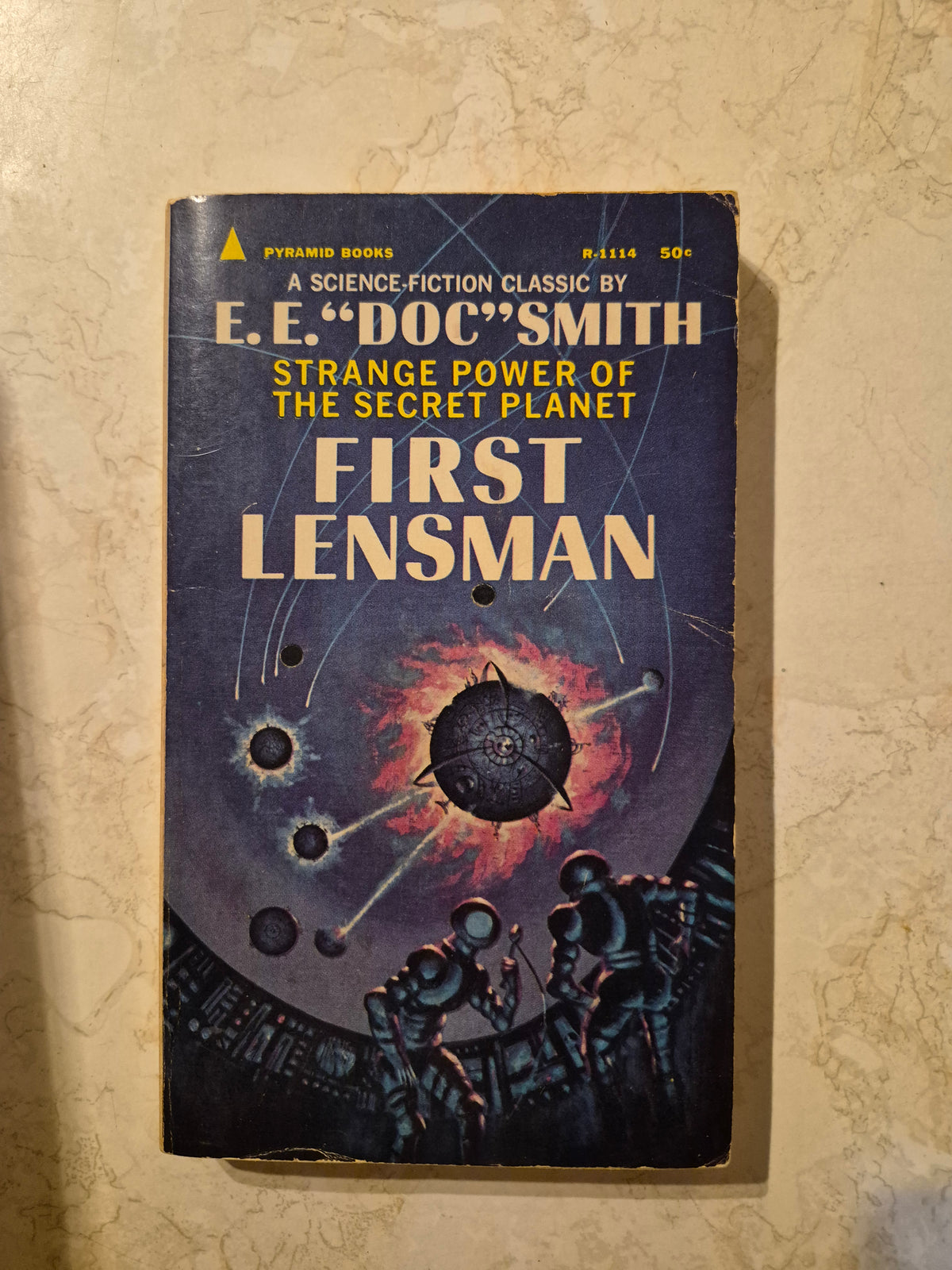 Front cover of First Lensman by E.E. Doc Smith showing cover creases