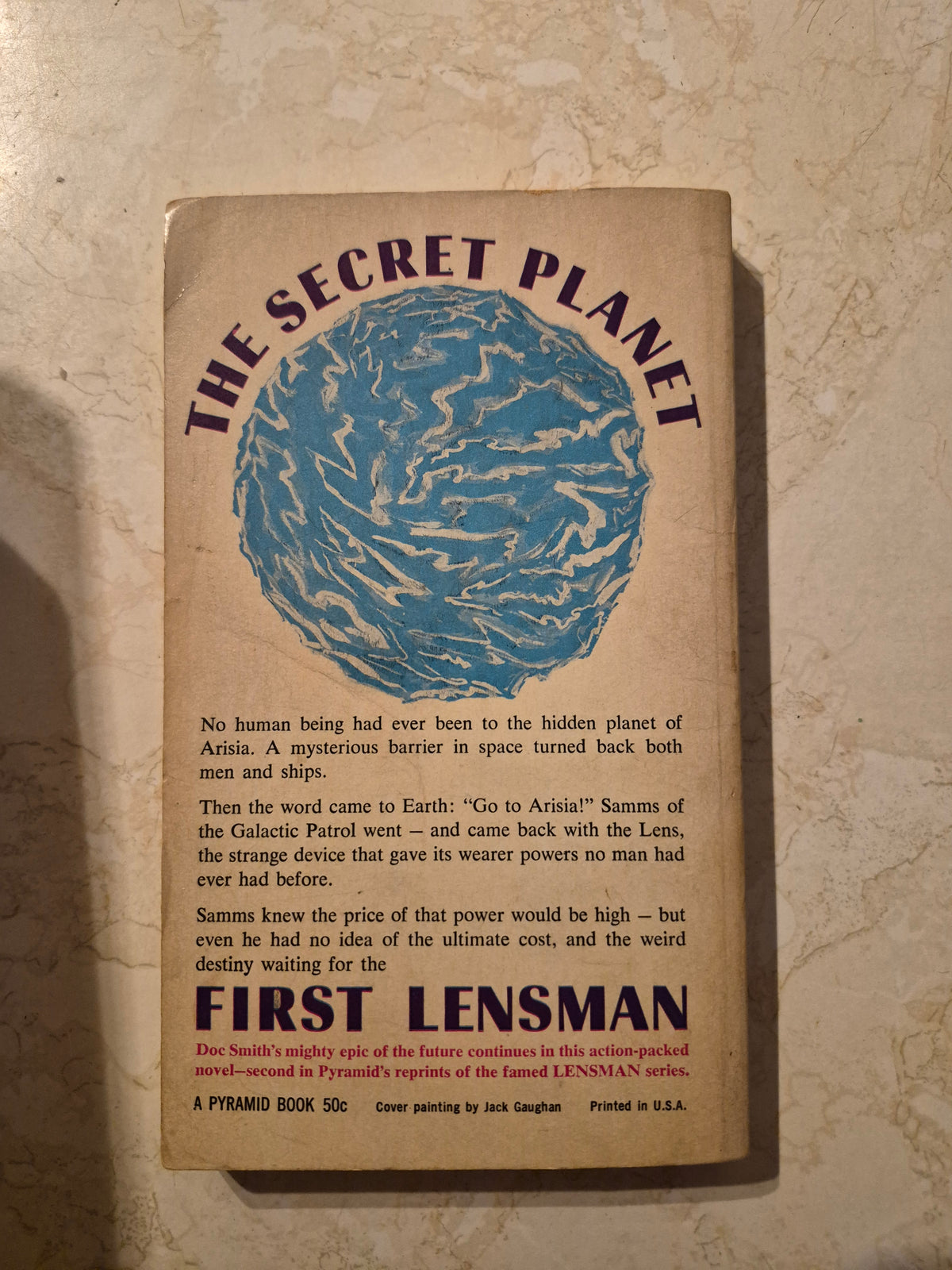 Back cover of First Lensman by E.E. Doc Smith with Arisia synopsis
