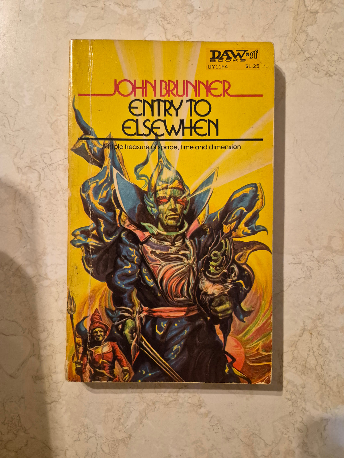 Front cover of Entry to Elsewhen by John Brunner, DAW paperback