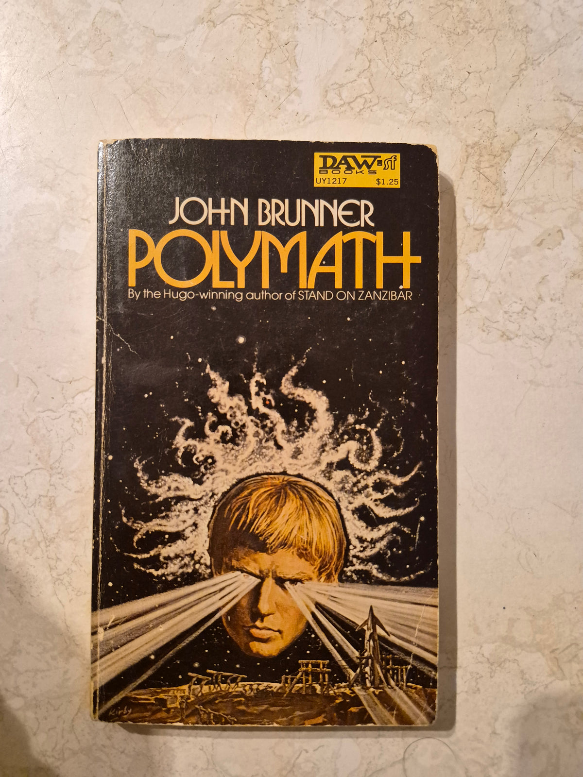 Front cover of Polymath by John Brunner, DAW Books paperback