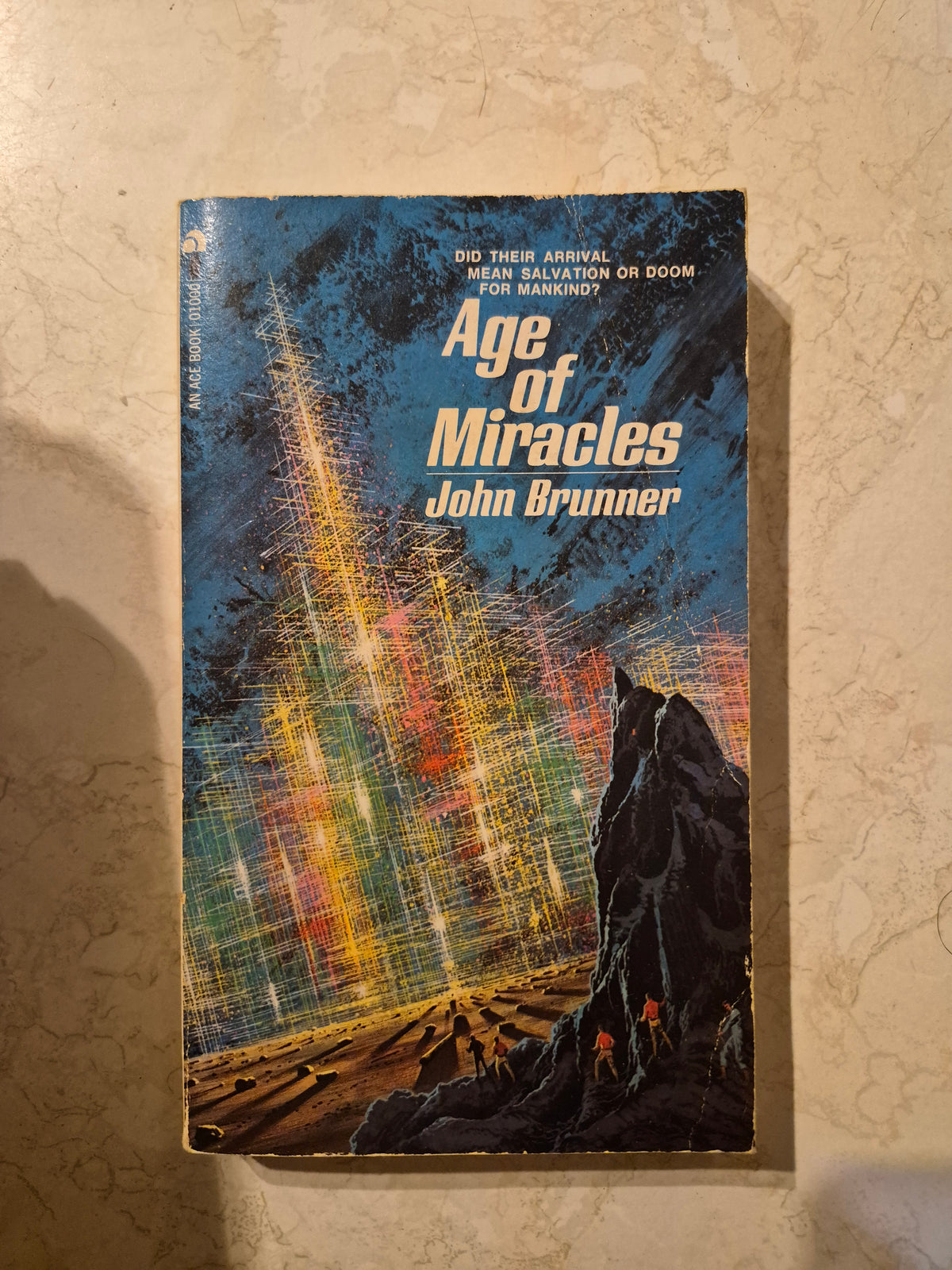 Front cover of Age of Miracles by John Brunner, vintage Ace paperback