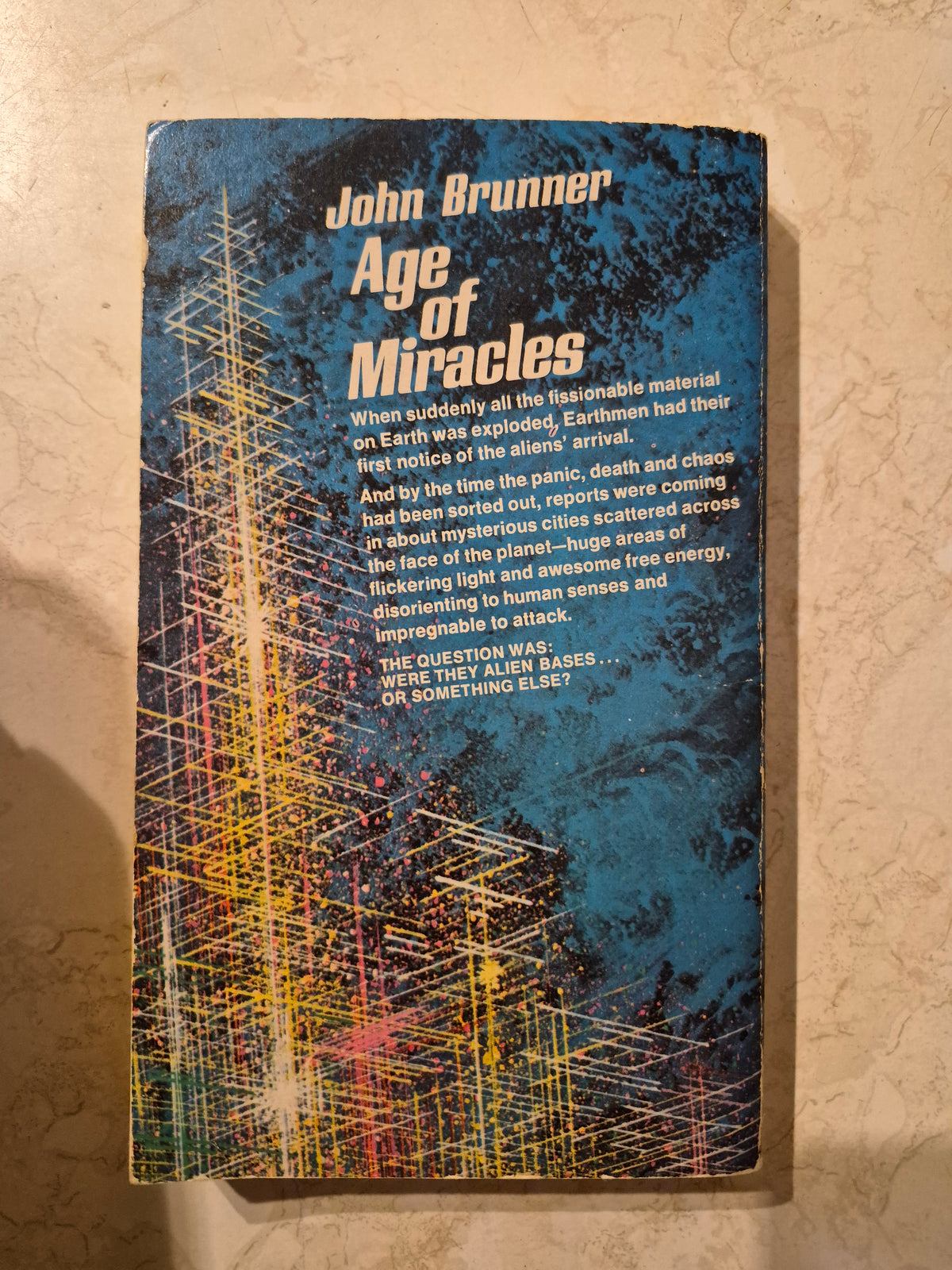 Back cover of Age of Miracles by John Brunner with story synopsis
