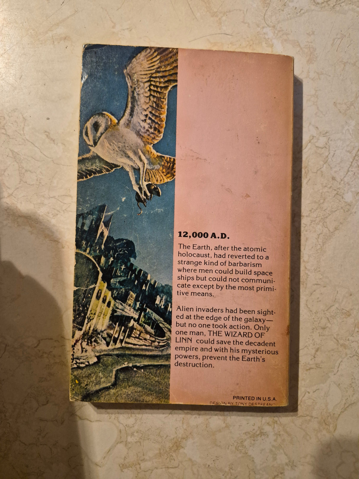 Back cover of The Wizard of Linn by A.E. van Vogt showing synopsis and wear