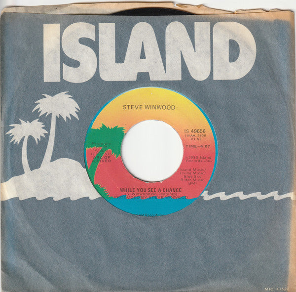 Steve Winwood : While You See A Chance / Vacant Chair (7", Single, Jac)