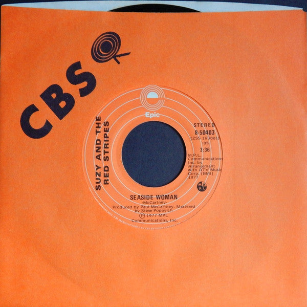 Suzy And The Red Stripes : Seaside Woman (7", Single)