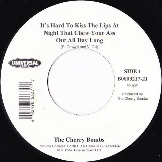 The Cherry Bombs* : It's Hard To Kiss The Lips At Night That Chew Your Ass Out All Day Long (7")