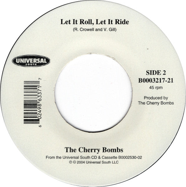The Cherry Bombs* : It's Hard To Kiss The Lips At Night That Chew Your Ass Out All Day Long (7")