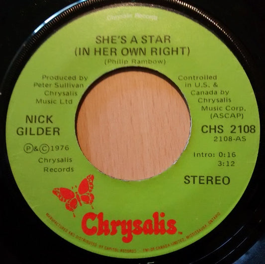 Nick Gilder : She's A Star (In Her Own Right)  (7", Single)
