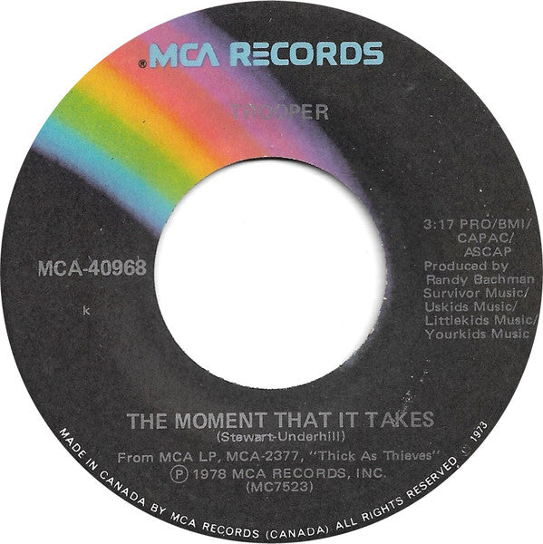 Trooper (4) : The Moment That It Takes (7", Single)