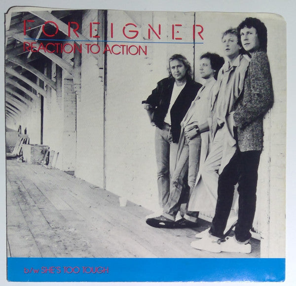 Foreigner : Reaction To Action / She's Too Tough (7", Single)
