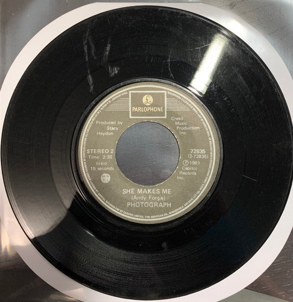 Photograph (2) : Last Dance / She Makes Me (7", Single)