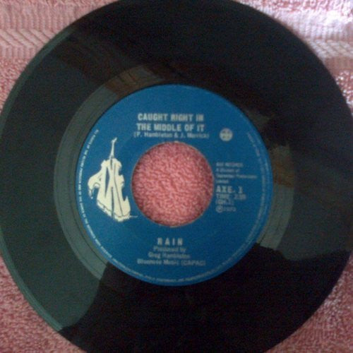 Rain (25) : Stop Me From Believing (7", Single)