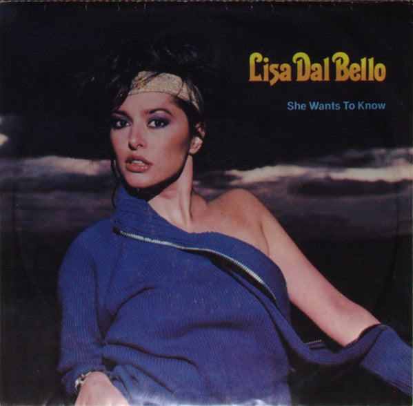 Lisa Dal Bello : She Wants To Know (7", Single, Fol)