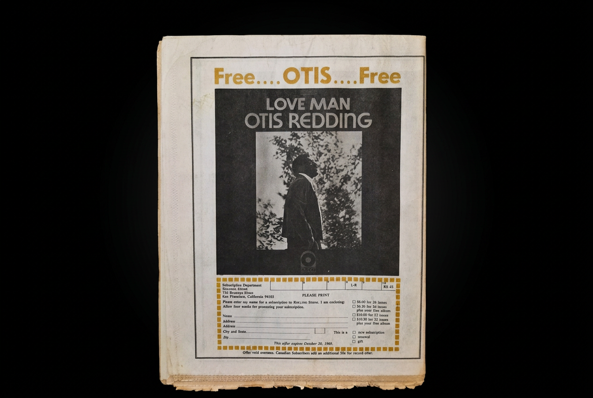 Inside page with the vintage Otis Redding Love Man subscription advertisement, on a solid black background