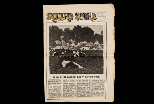 Rolling Stone No. 42 masthead page with the Woodstock feature and festival photograph, on a solid black background